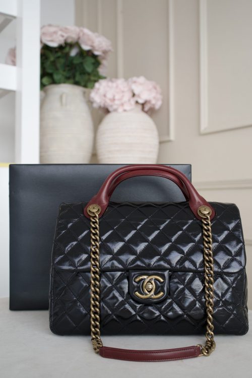 SOLD - Chanel Large Castle Rock Black & Burgundy Flap Bag with Antique Gold Hardware