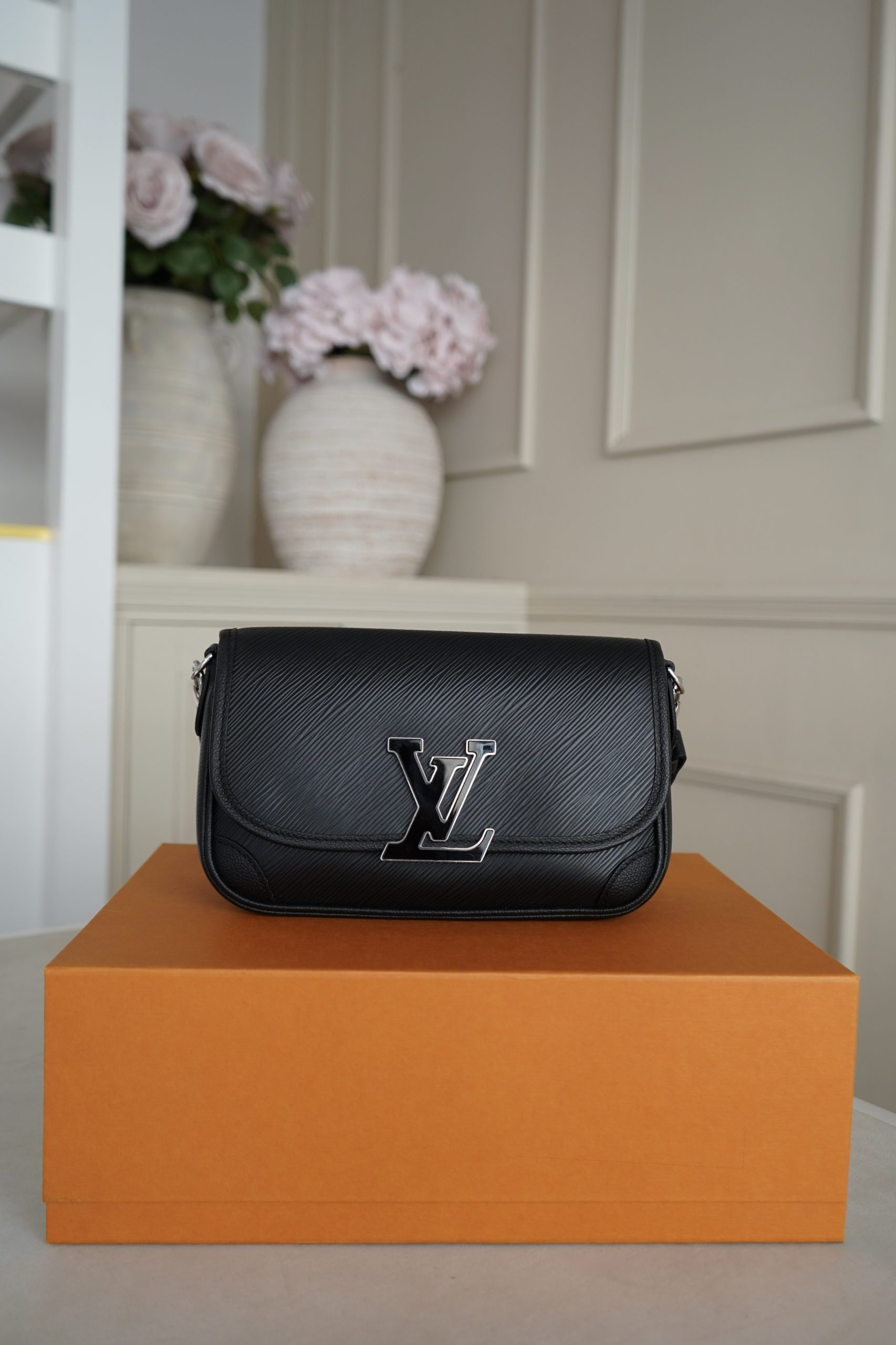 Louis Vuitton Buci bag with silver toned LV resin logo